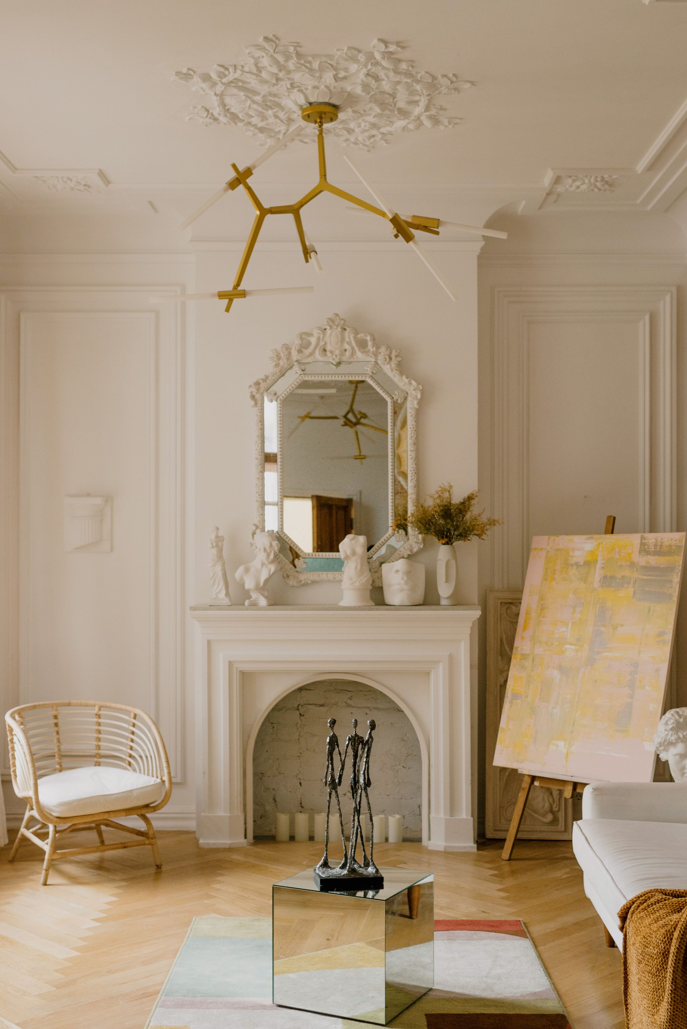 Bed-Stuy Brownstones: Historic moldings and a traditional fireplace reimagined through a clean, contemporary interior.